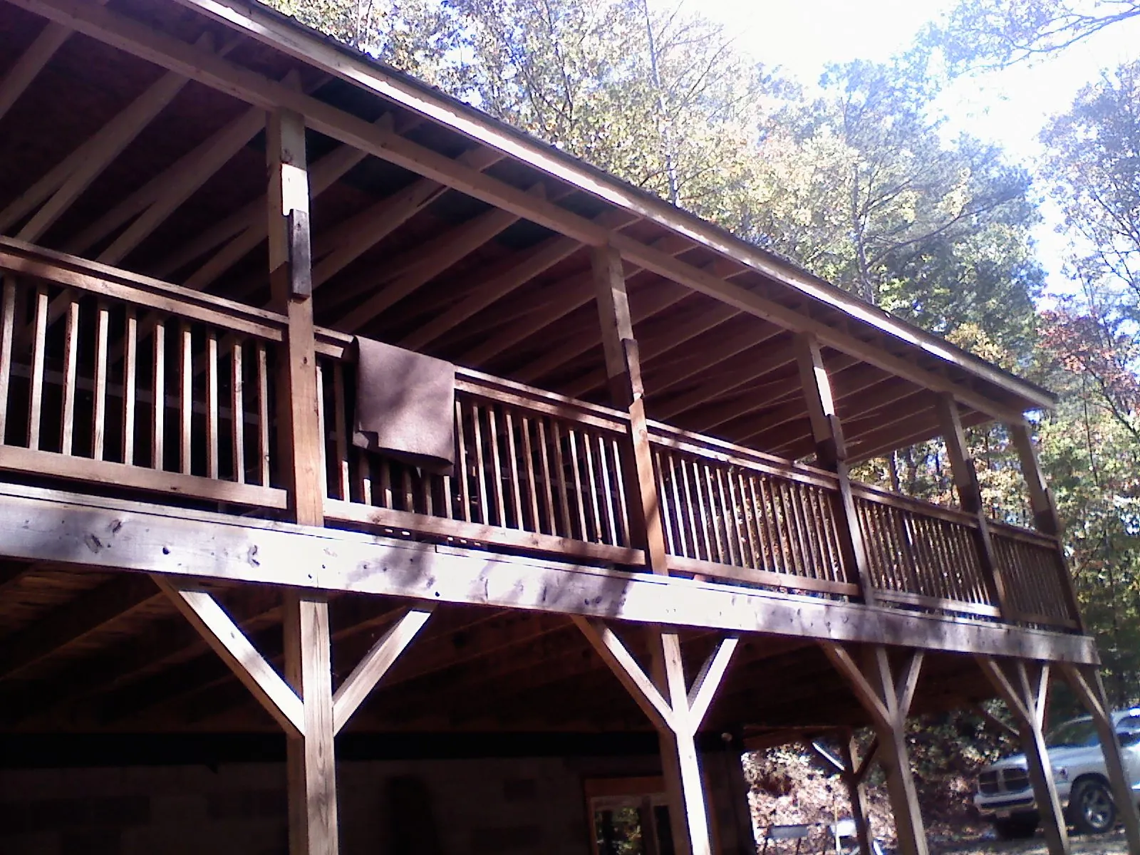 Timber framing under a new elevated porch and deck — Roof Leak Repair in Tetonia by Roofing Brothers